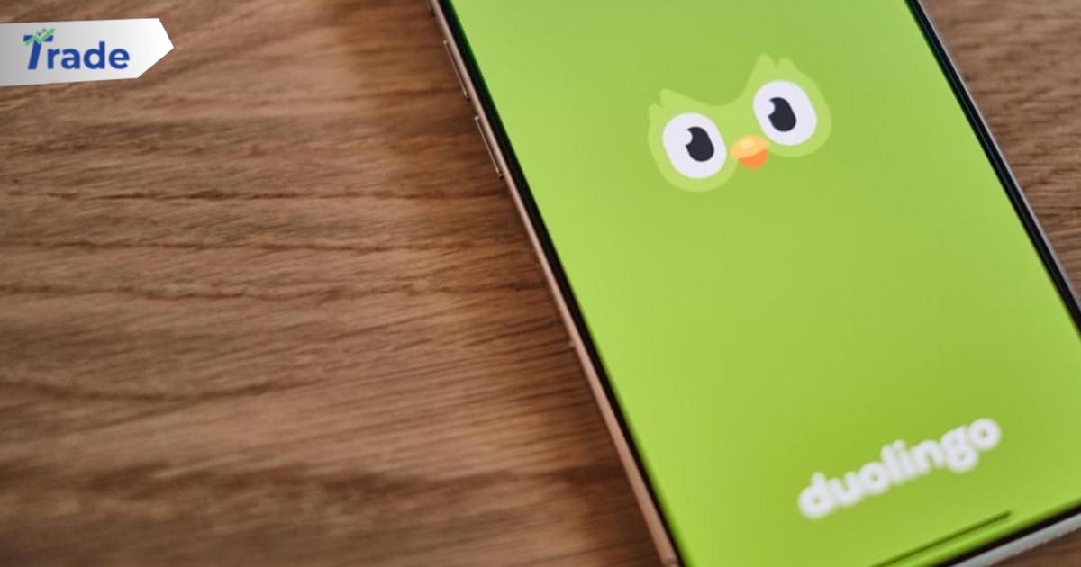 A green phone with a face drawn on it