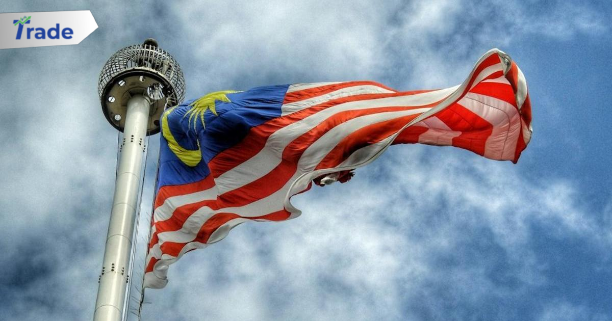 low angle photography of waving flag of Malaysia during daytime